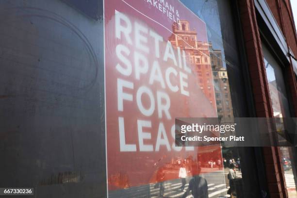 Sign advertises retail space in a trendy West Village neighborhood on April 11, 2017 in New York City. Many residents and tourists alike are noticing...