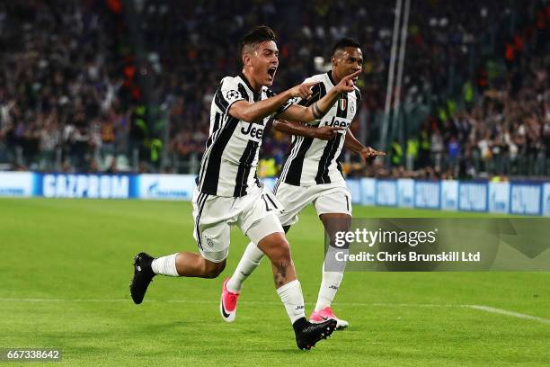 Paulo Dybala of Juventus celebrates scoring the second goal to make the score 2-0 with Alex Sandro during the UEFA Champions League Quarter Final...