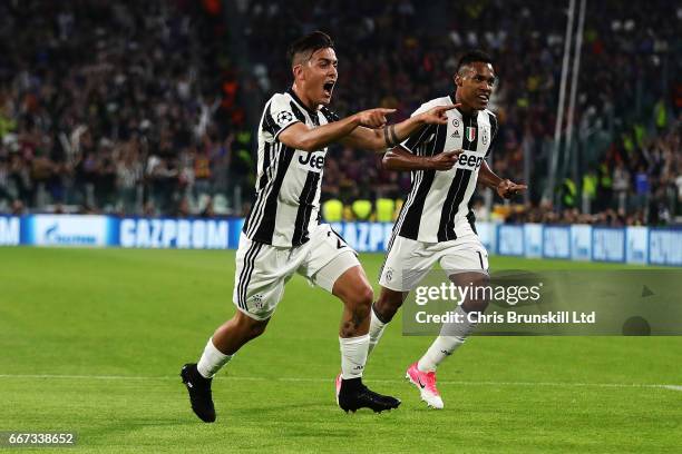 Paulo Dybala of Juventus celebrates scoring the second goal to make the score 2-0 with Alex Sandro during the UEFA Champions League Quarter Final...