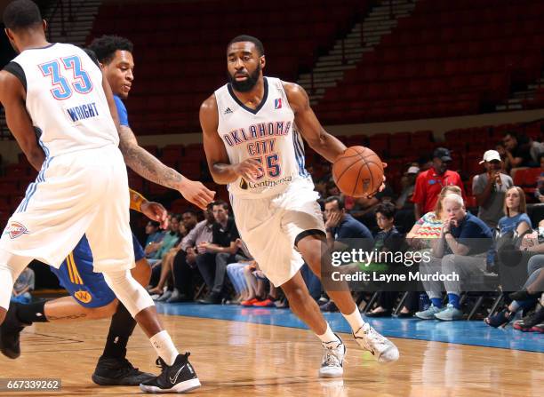 Reggie Williams of the Oklahoma City Blue dribbles the ball against the Santa Cruz Warriors during the first round of an NBA D-League playoff game on...