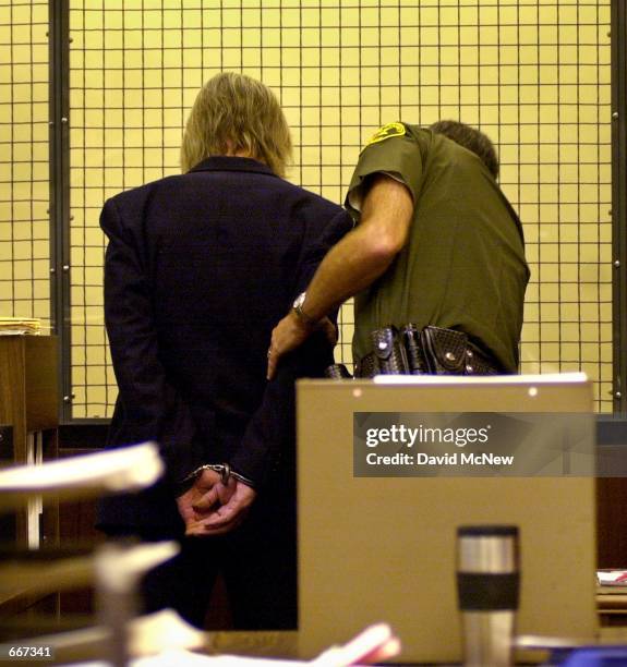 Actor Jan-Michael Vincent is taken into custody, pending a $5,000.00 bail at his probation violation hearing in Laguna Niguel, CA, July 11, 2000. The...