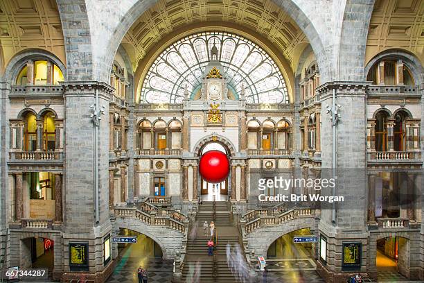 traveling art installation - red ball project - antwerp city belgium stock pictures, royalty-free photos & images