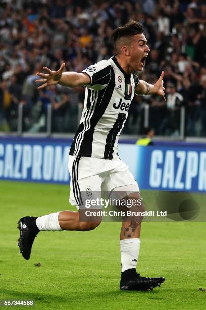 Paulo Dybala of Juventus celebrates scoring the second goal to make the score 2-0 during the UEFA Champions League Quarter Final first leg match...