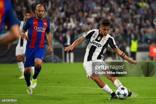 Paulo Dybala of Juventus scores his team's second goal during the UEFA Champions League Quarter Final first leg match between Juventus and FC...
