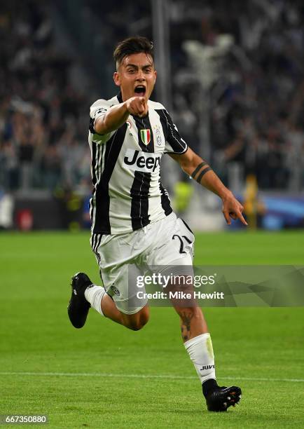 Paulo Dybala of Juventus celebrates after scoring his team's second goal during the UEFA Champions League Quarter Final first leg match between...