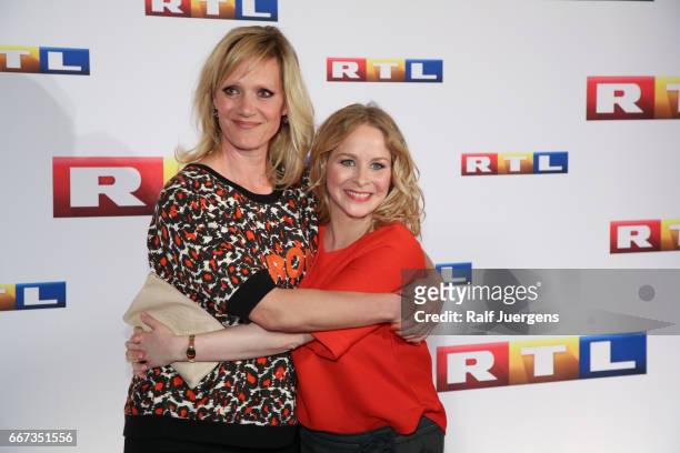 Anna Schudt and Jasmin Schwiers attend the premiere of the film 'Gaby Koester - Ein Schnupfen haette auch gereicht' at Residenz Kino on April 11,...