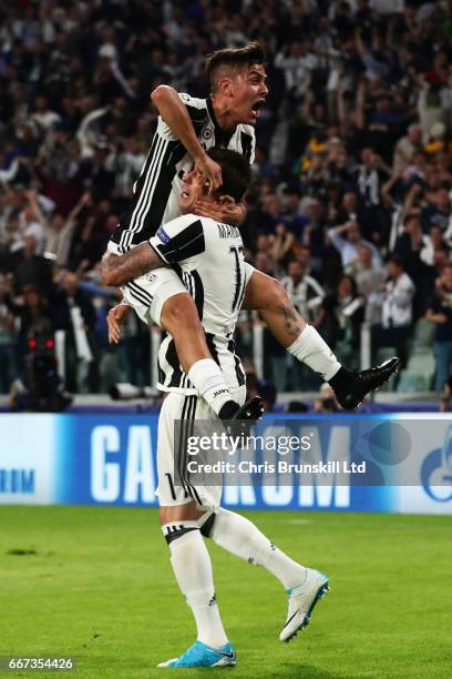 Paulo Dybala of Juventus celebrates scoring the second goal to make the score 2-0 with Mario Mandzukic during the UEFA Champions League Quarter Final...