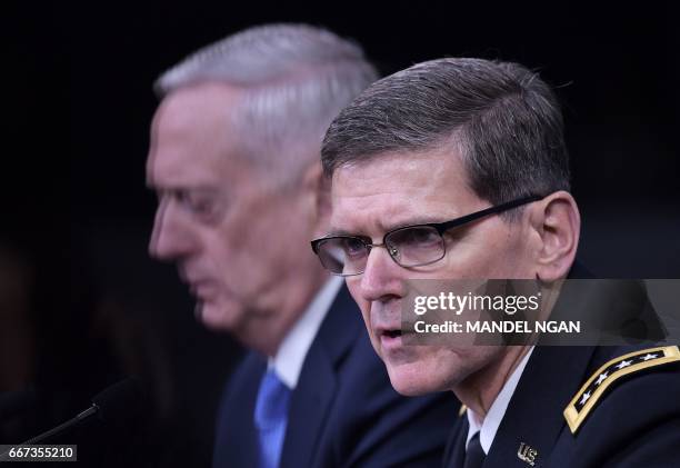 Secretary of Defense James Mattis and US Central Command Commander Joseph Votel take part in a briefing at the Pentagon in Washington, DC on April...