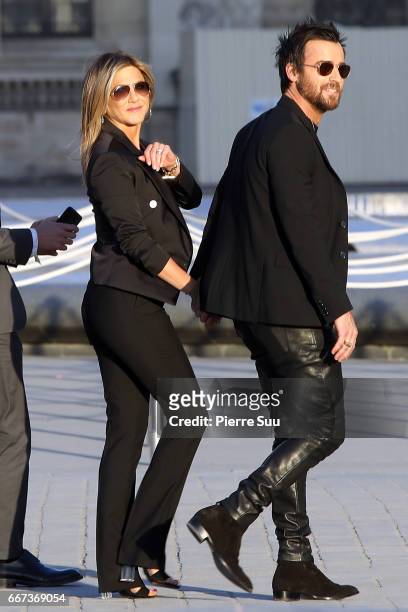 Actors Justin Theroux and his wife Jennifer Aniston arrive at the Louis Vuitton's Dinner for the Launch of Bags by Artist Jeff Koons at Musee du...