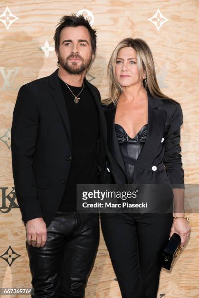 Actors Justin Theroux and Jennifer Aniston attend the 'Louis Vuitton Masters: a collaboration with Jeff Koons' dinner at Musee du Louvre on April 11,...
