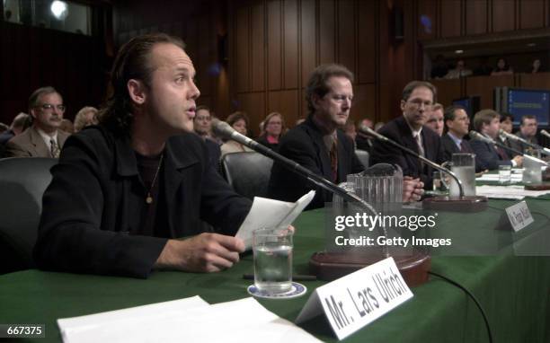 Lars Ulrich, of the rock band Metallica, left, Roger McGuinn, founding member of 60s rock group The Byrds, center, and Napster Chief Executive...