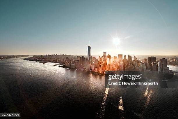 aerial of manhattan, nyc at sunrise - urban skyline stock-fotos und bilder