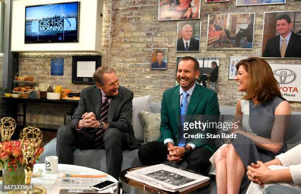 Host Charlie Rose, Master's Champion Sergio Garcia and Norah O'Donnell gather in the CBS This Morning Show green room during the taping of the...