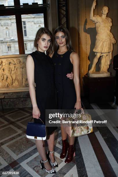 Model Taylor Hill attends the "LVxKOONS" exhibition at Musee du Louvre on April 11, 2017 in Paris, France.