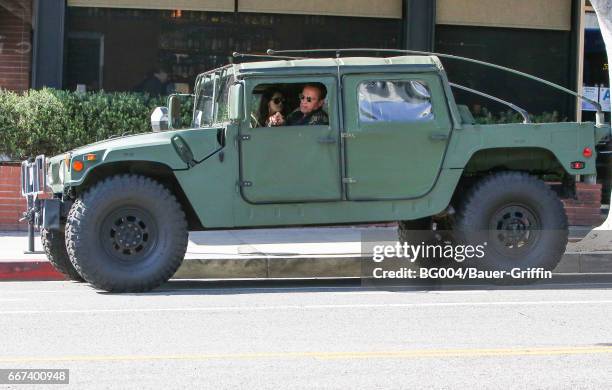 Arnold Schwarzenegger and his daughter Katherine are seen on April 11, 2017 in Los Angeles, California.