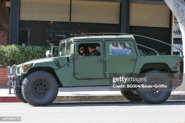 Arnold Schwarzenegger and his daughter Katherine are seen on April 11, 2017 in Los Angeles, California.