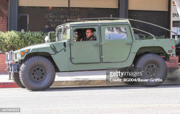 Arnold Schwarzenegger and his daughter Katherine are seen on April 11, 2017 in Los Angeles, California.