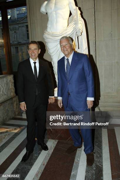 Jeff Koons and Larry Gagozian attend the "LVxKOONS" exhibition at Musee du Louvre on April 11, 2017 in Paris, France.