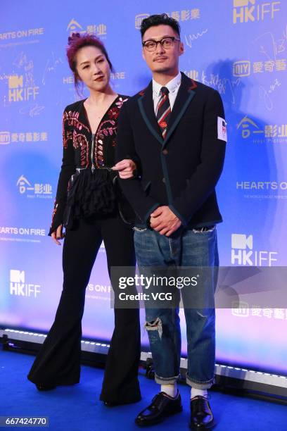 Actor Shawn Yue Man-lok, actress and singer Miriam Yeung attend the premiere of film 'Love off the Cuff' during the opening of the 41st Hong Kong...