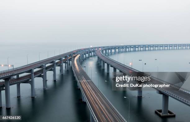 dalian xinghai bay bridge - china bridge stock pictures, royalty-free photos & images