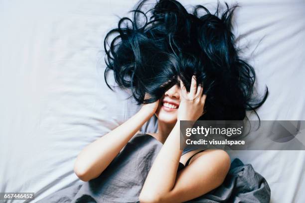 young woman laughing - asian woman long hair stock pictures, royalty-free photos & images