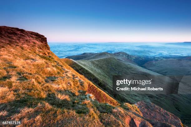 sunrise on pen y fan and the brecon beacons, wales - brecon beacons stock pictures, royalty-free photos & images