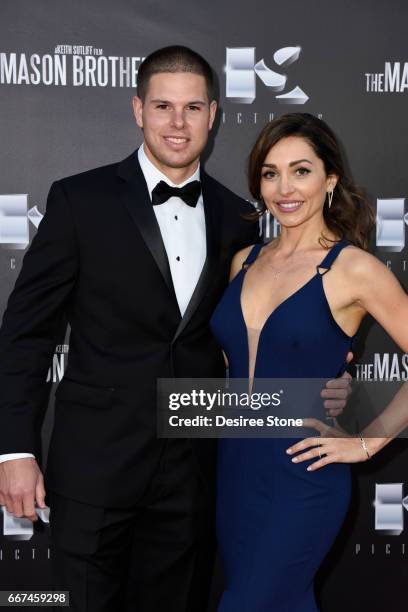 Keith Sutliff and Carlotta Montanari attend the premiere of "The Mason Brothers" at the Egyptian Theatre on April 11, 2017 in Hollywood, California.