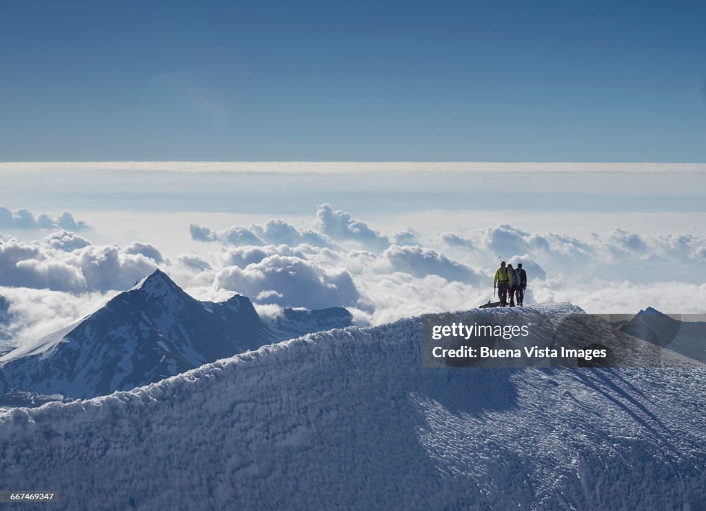 Climbing team on a snowy ridge