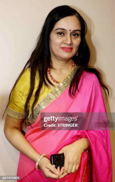 Indian Bollywood actress Padmini Kolhapure poses for a photograph during a promotional event in Mumbai on late April 11, 2017. / AFP PHOTO / STRINGER