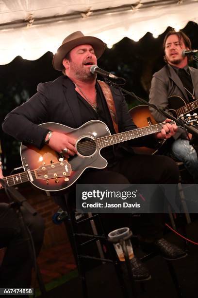 Recording Artists Lee Brice and Jon Stone perform at the 2017 "Hope Song" Fundraiser at East Ivy Mansion on April 11, 2017 in Nashville, Tennessee.