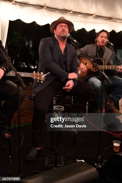 Recording Artists Lee Brice and Jon Stone perform at the 2017 "Hope Song" Fundraiser at East Ivy Mansion on April 11, 2017 in Nashville, Tennessee.