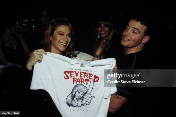 Dr. Judy Kuriansky and John Wayne Bobbitt at Tunnel Club, New York, New York, 1994.