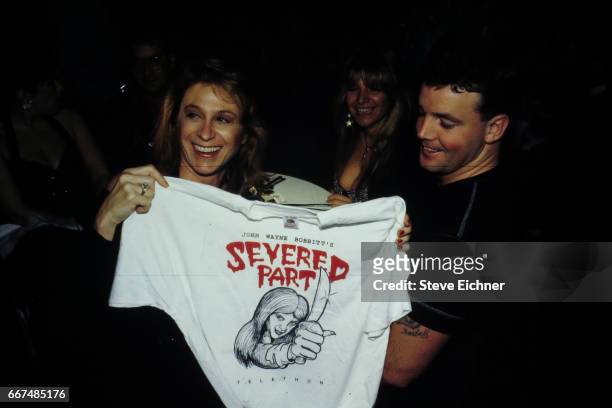 Dr. Judy Kuriansky and John Wayne Bobbitt at Tunnel Club, New York, New York, 1994.
