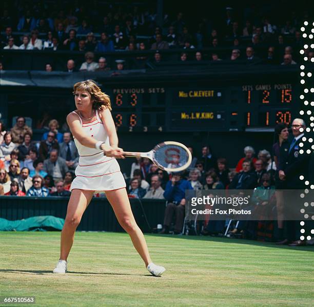 American tennis player Chris Evert competing against Billie Jean King in the quarter-finals of the Women's Singles tournament at The Championships,...