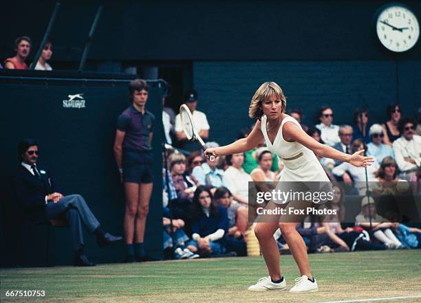 American tennis player Chris Evert competing to progress to reach the semifinals of the Ladies' Singles tournament at The Championships, Wimbledon,...