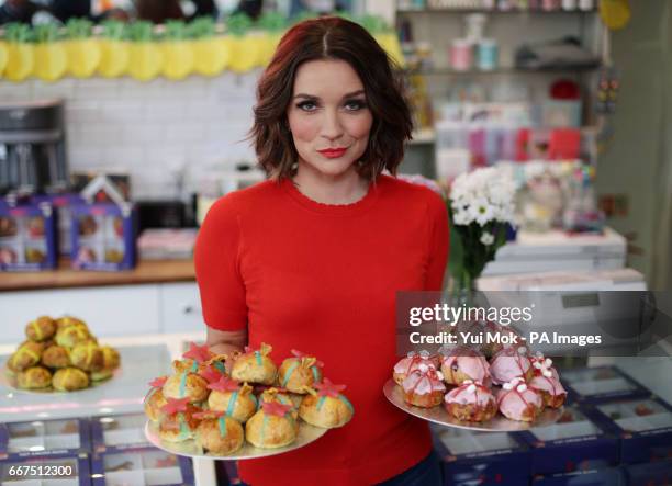 Great British Bake Off winner Candice Brown in store at Primrose Bakery in Covent Garden, London, to launch her range of 'Tot Cross Buns' celebrating...