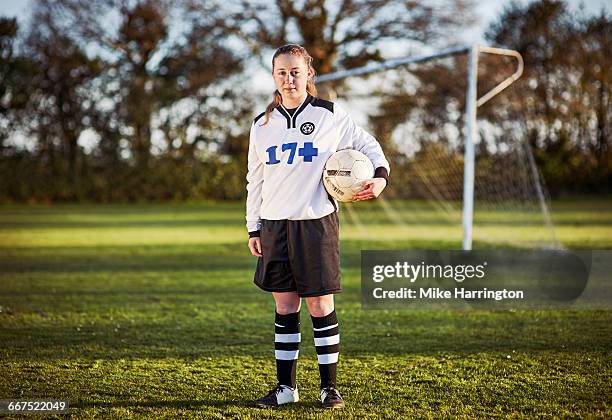 full length portrait of young female footballer - long term vision stock pictures, royalty-free photos & images