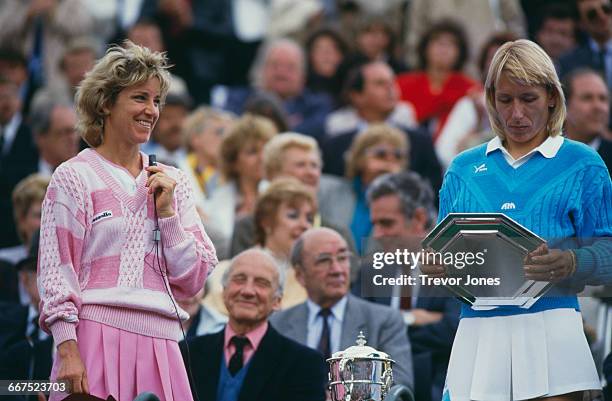 American tennis players Chris Evert and Martina Navratilova with the trophies after Evert beat Navratilova to win the Women's Singles at the French...