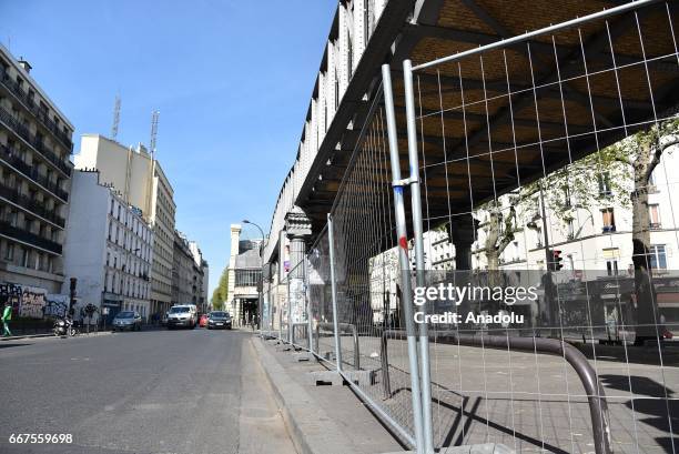 An outside view of a subway station where the fences are put around to prevent the entrance of refugees to Stalingrad, in which they want to live, in...