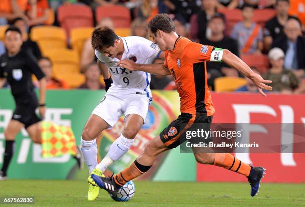 Suzuki Yuma of the Antlers takes on the defence during the AFC Asian Champions League Group Stage match between the Brisbane Roar and Kashima Antlers...