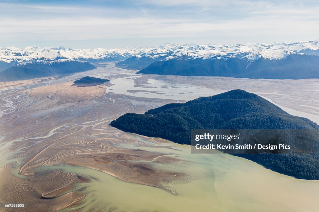 Aerial view of low tide and Woronkofski Island in the Stikine River Delta on a clear day, Wrangell, Southeast Alaska, USA, Spring