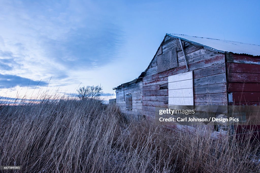 An old shed sits in twilight at the village of Igiugig, Alaska, at the headwaters of the Kvichak River.