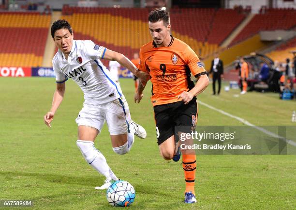 Jamie Maclaren of the Roar and Shoji Gen of the Antlers compete for the ball during the AFC Asian Champions League Group Stage match between the...