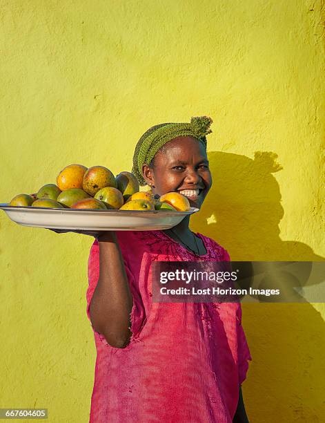 ethiopian woman selling mangoes, addis ababa, ethiopia - mango stock pictures, royalty-free photos & images