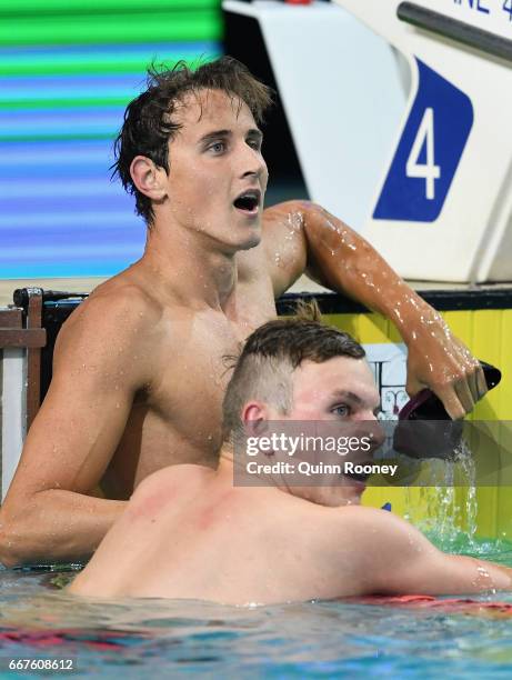 Kyle Chalmers congratulates Cameron McEvoy of Australia on winning the Men's 100m Freestyle during the 2017 Australian Swimming Championships at the...