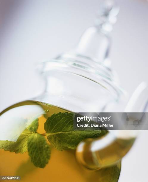 mint tea in glass teapot - mint tea stock pictures, royalty-free photos & images