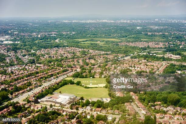 aerial view of suburban cricket field, manchester, united kingdom - greater manchester photos et images de collection