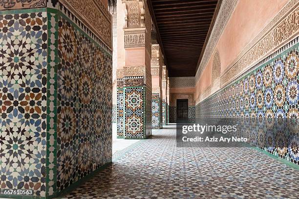 tiled portico at ben youssef madrasa, marrakech, morocco - maroc school stock-fotos und bilder