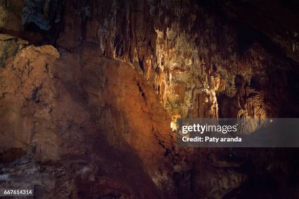 a cave in the city of san joaquin - scuro stock pictures, royalty-free photos & images