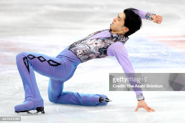 Yuzuru Hanyu of Japan competes in the Men's Singles Short Program during day two of the World Figure Skating Championships at Hartwall Arena on March...